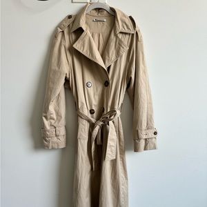 Reformation long trench in good condition.